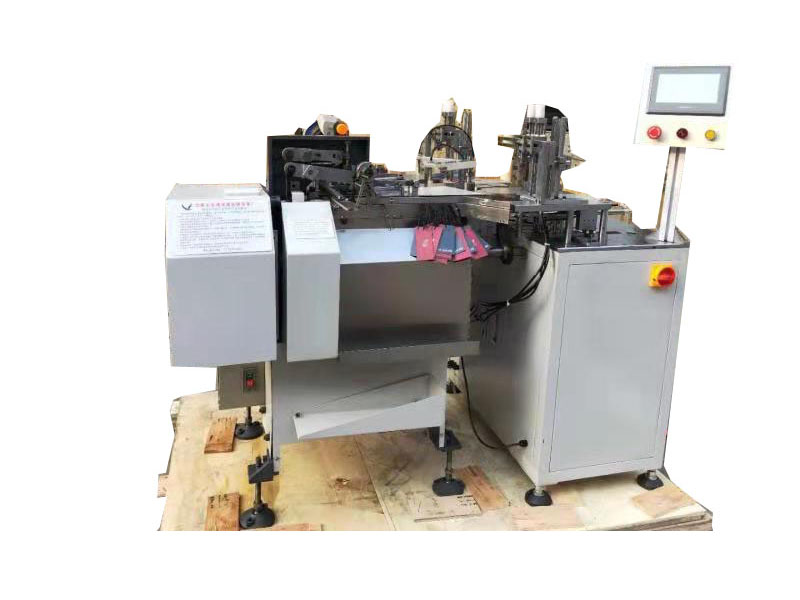 Hang Tag Stringer Universal Machinery